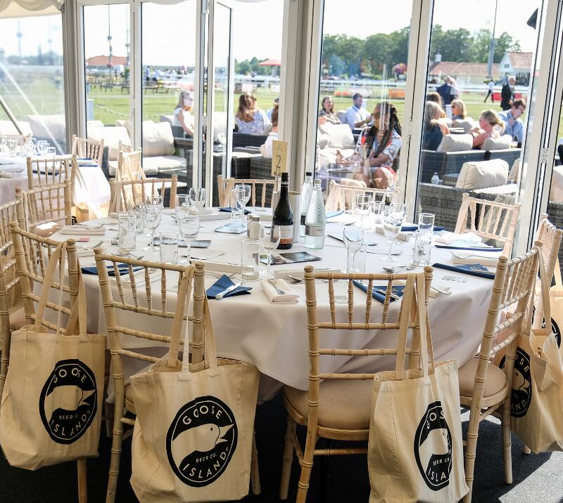 Table set up in a marquee.