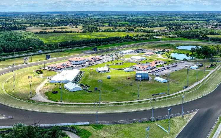 A birds eye view of the Chelmsford City Racecourse track and buildings.
