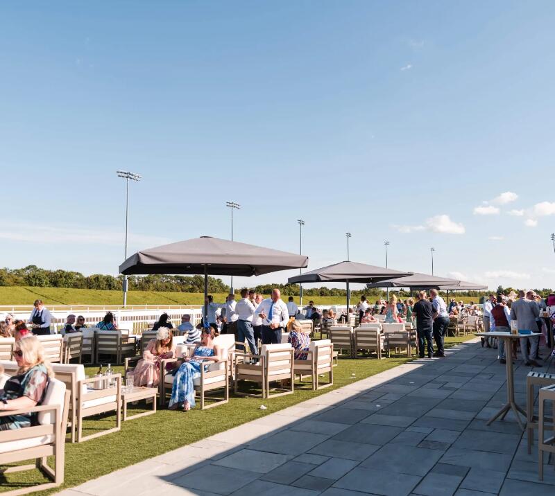 Outside seating next to the racecourse.