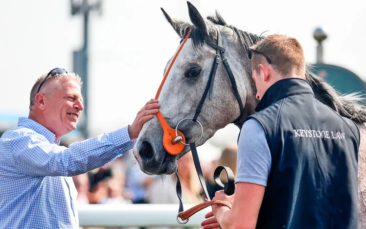 A close up of horse and owner at Chelmsford City Racecourse.