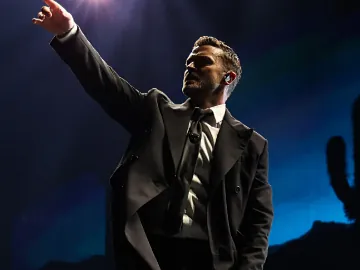Justin Timberlake points out over the crowd